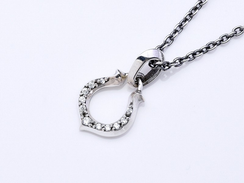 SLANT HORSE SHOE TOP