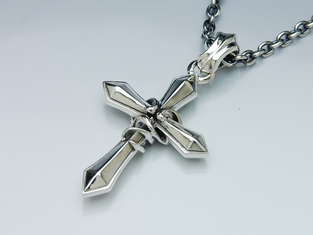 TANGLE SNAKE CROSS